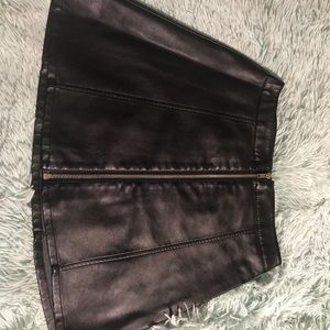 Black zip up skirt.